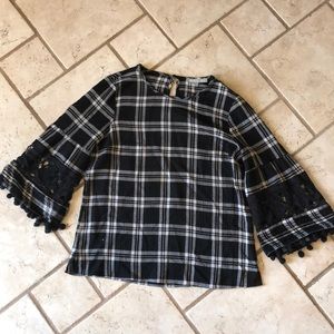 Plaid linen blouse with Pom-Pom embellishments